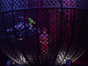 Big sphere shows off daredevil motorbike riders