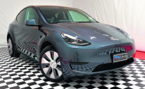 Tesla goes to auction as demand for EVs soars