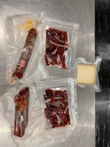 Visa cancelled, fined and sent home after risky suitcase find