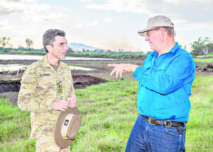 Assessing the flood damage firsthand on Munbilla organic farming operation
