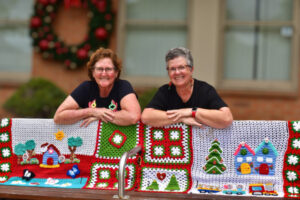 Yarn bomb explosion brings Christmas to town