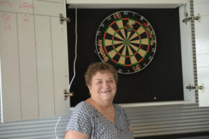 Dedicated darts group targets bullseye