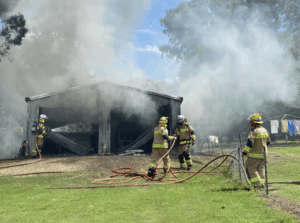 Boonah road shut as fire engulfs shed